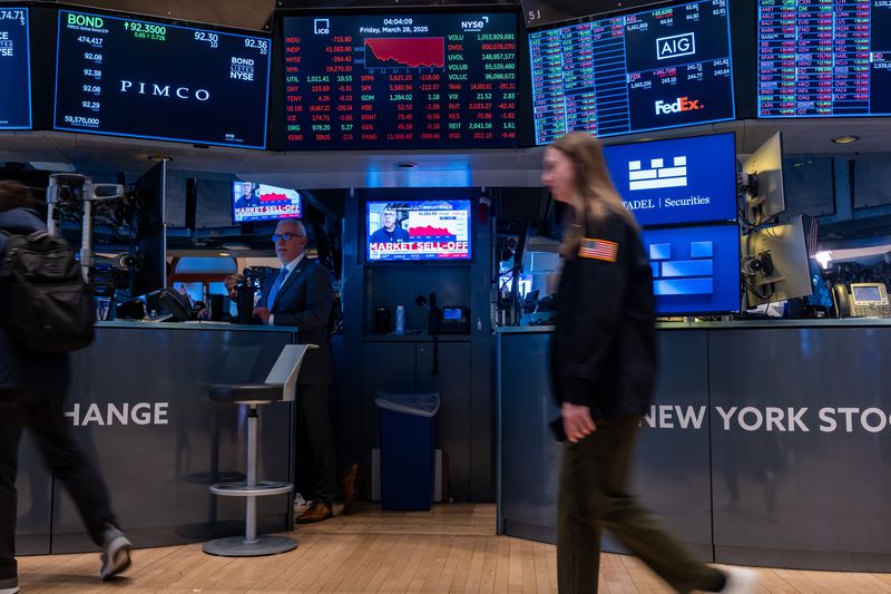 raders work on the floor of the New York Stock Exchange