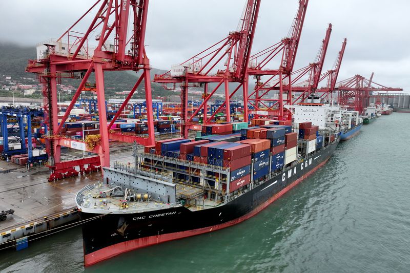 A cargo ship moors at the container terminal berth of Lianyungang Port for loading and unloading containers in Lianyungang City, Jiangsu Province, China, on May 9, 2025.