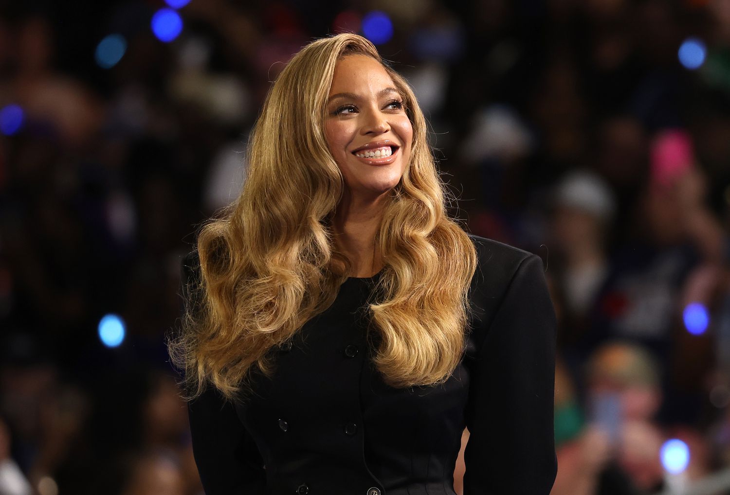Beyonce looks on during a campaign rally with Democratic presidential nominee