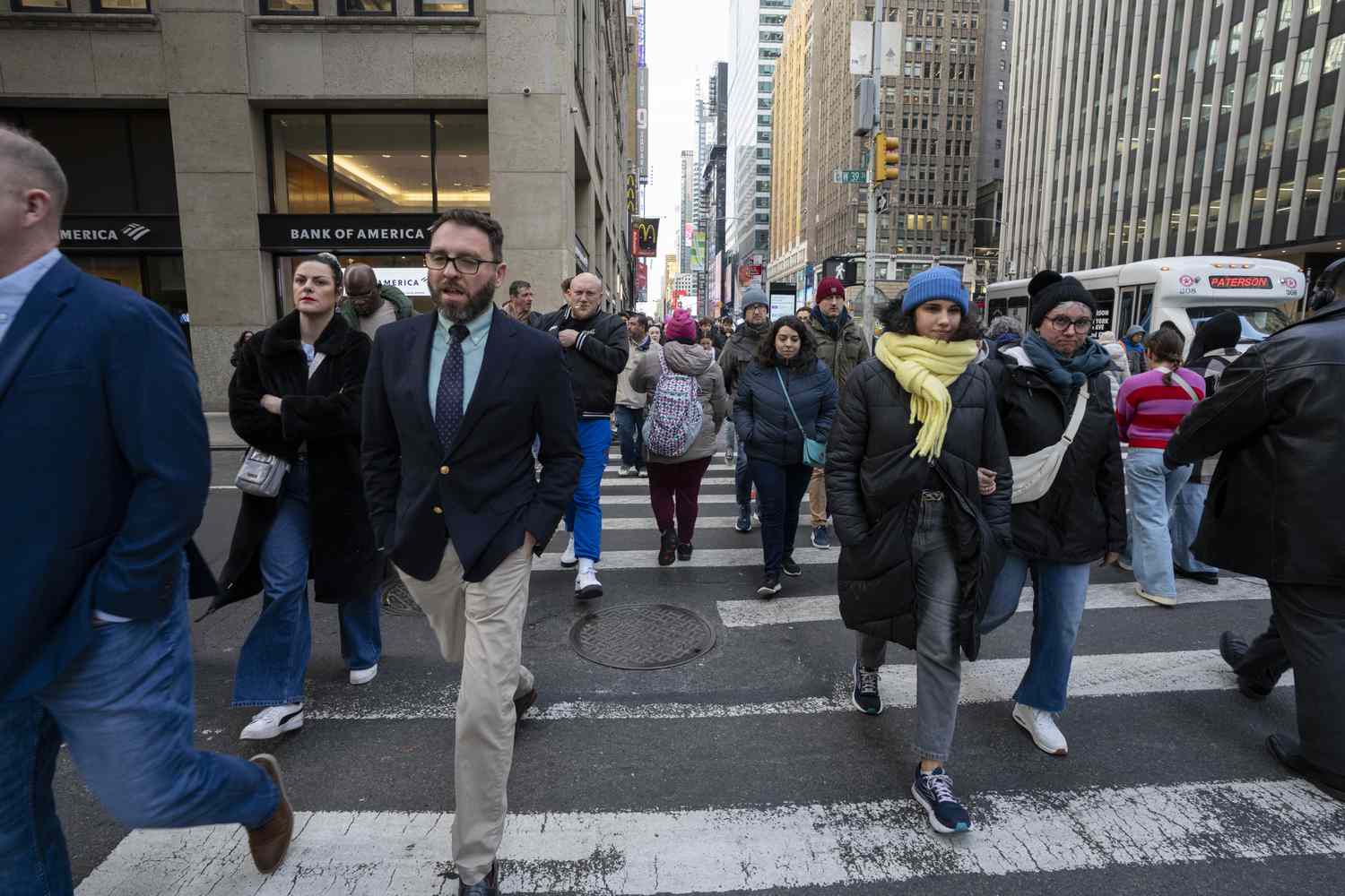 A view of people crossing the street on 7th Avenue in Midtown on March 04, 2025 in New York City. 