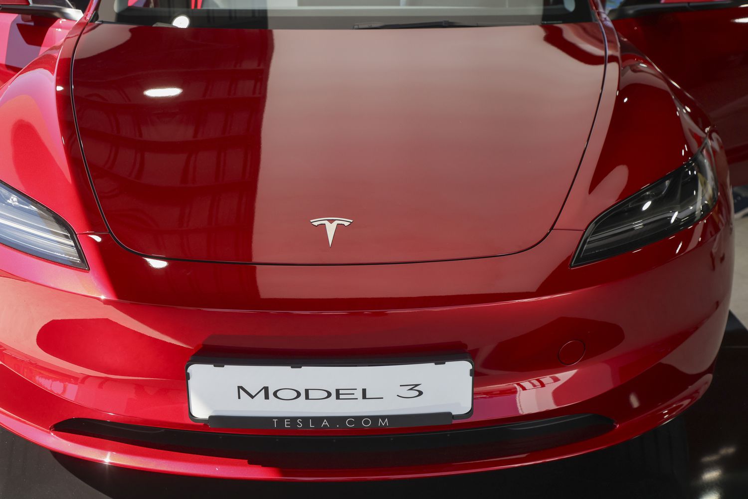 A Tesla Model 3 electric vehicle (EV) at the Tesla Inc. pavilion in the Open Space area during the Munich Motor Show (IAA) in Munich, Germany, on Tuesday, Sept. 5, 2023.