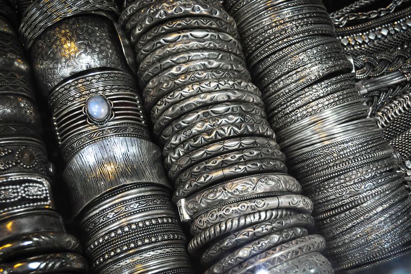rows of silver bangles