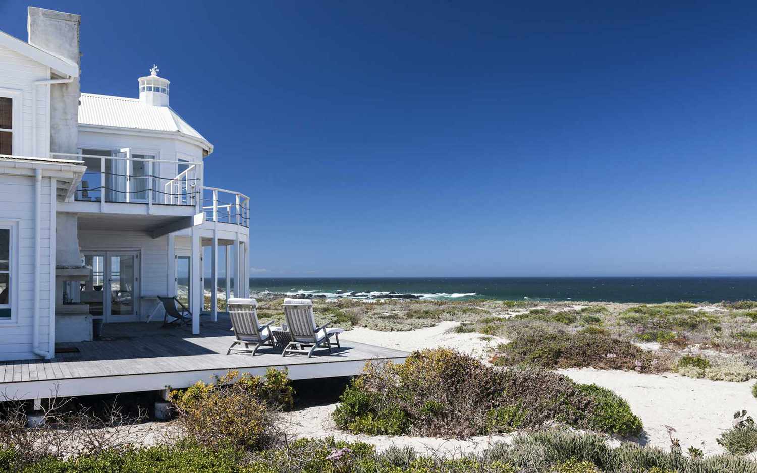 Beach house overlooking ocean.