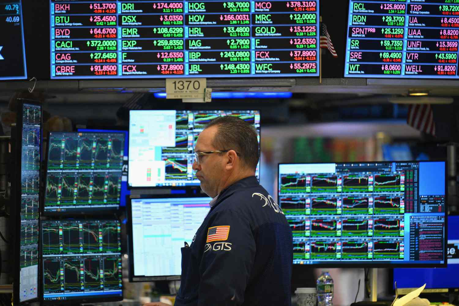 A trader works on the floor of the New York Stock Exchange.