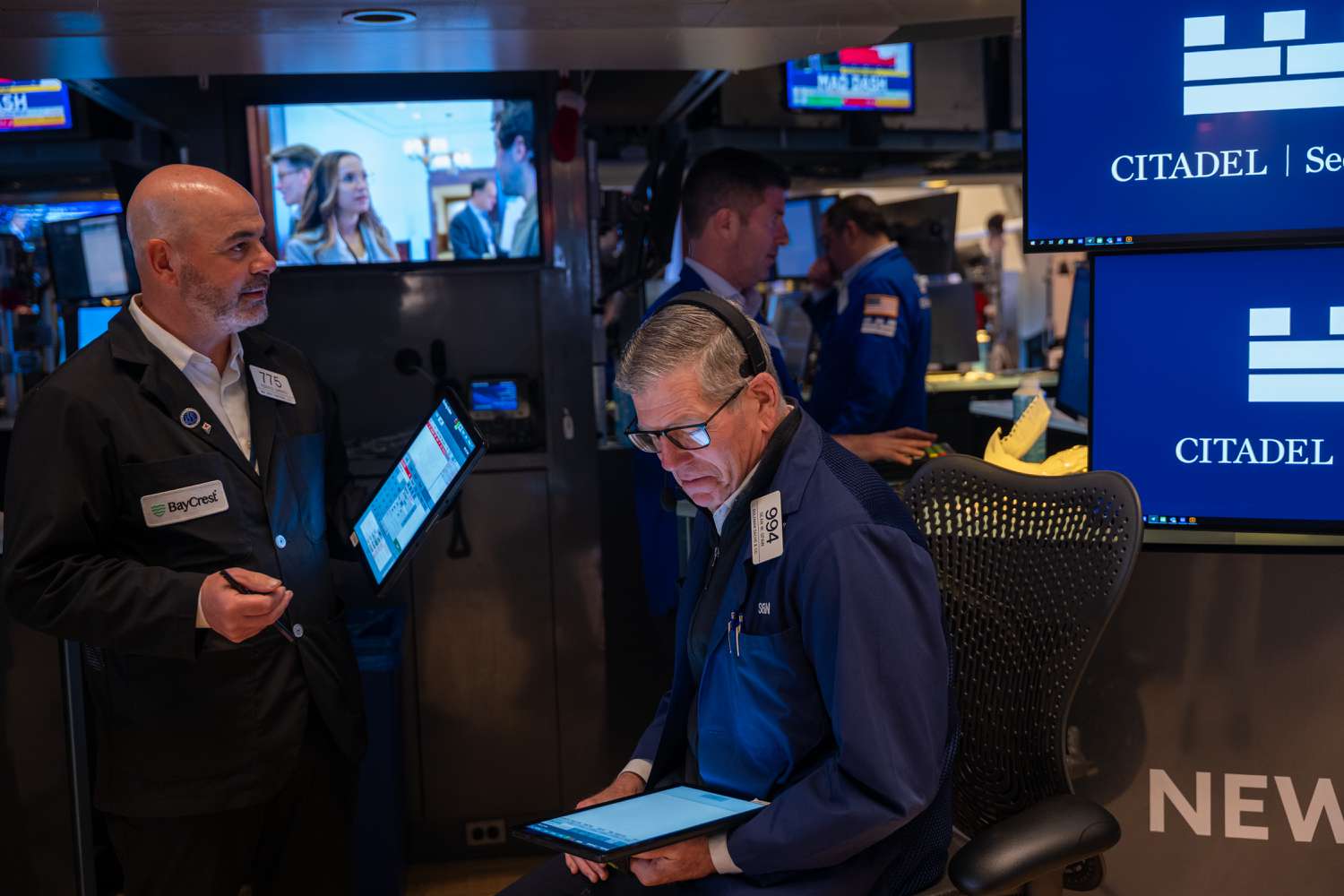 Traders work on the floor of the New York Stock Exchange on May 13, 2025