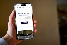 AppLovin website arranged on a smartphone.