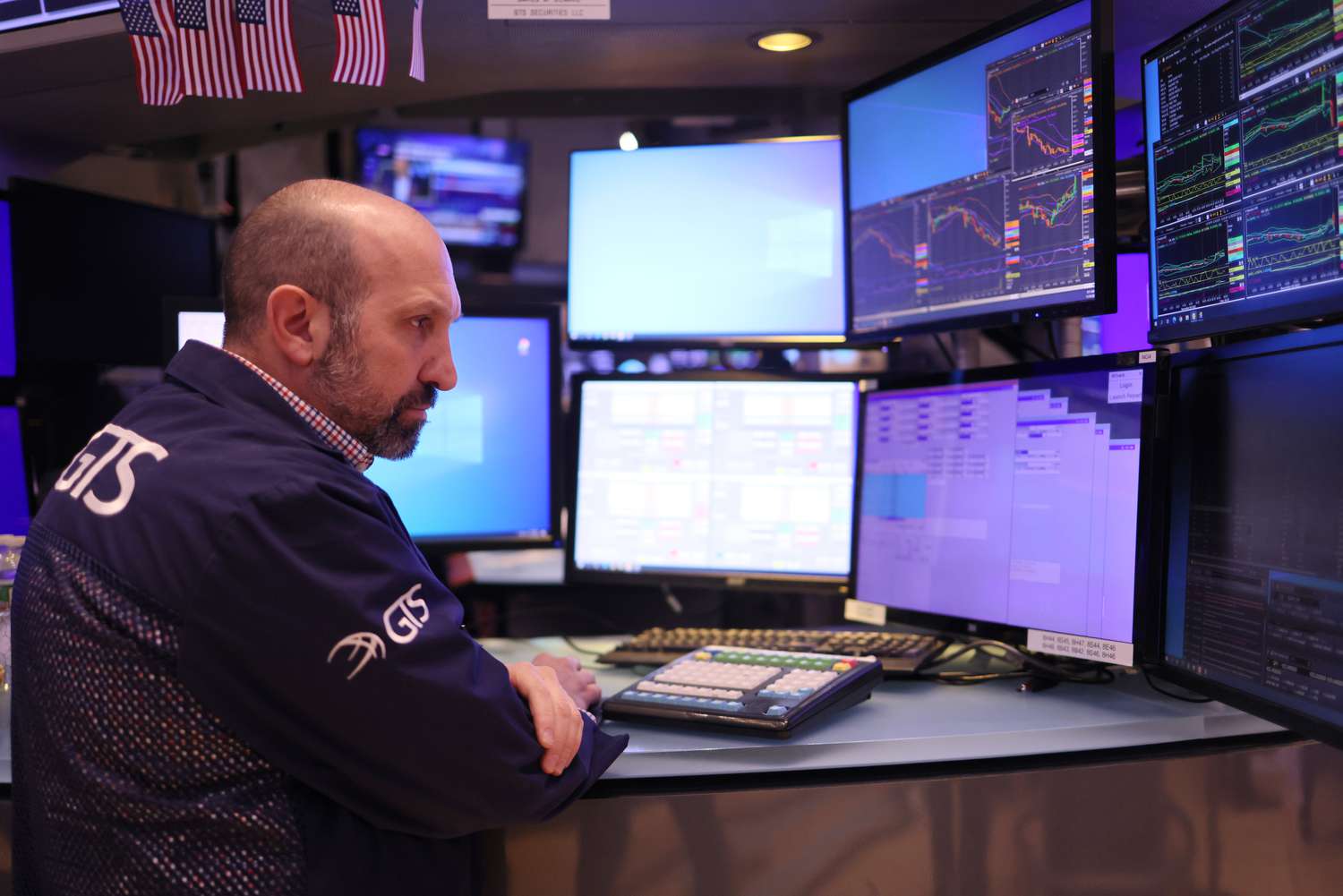 Traders work on the floor of the New York Stock Exchange.