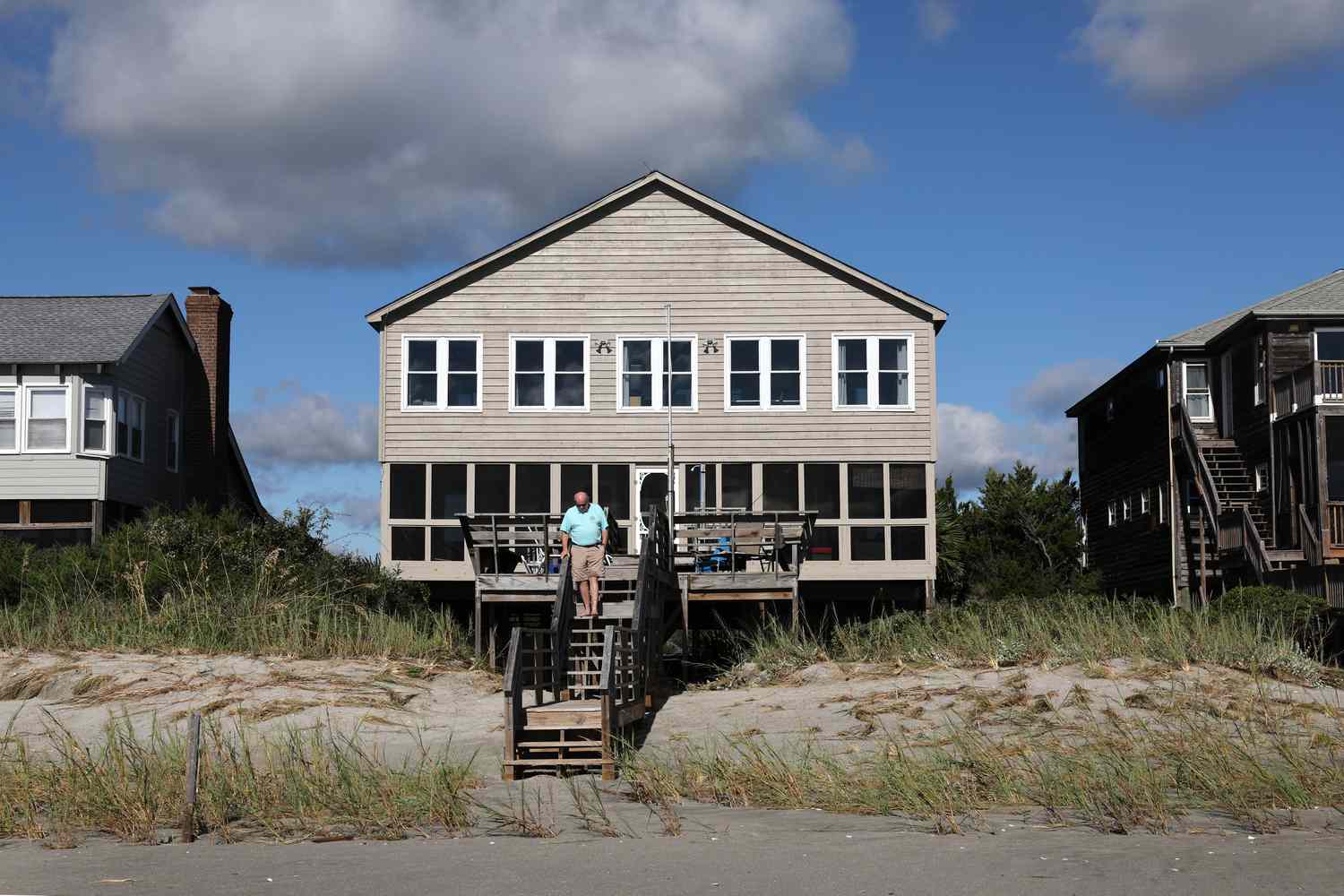 Man leaving his beachfront property