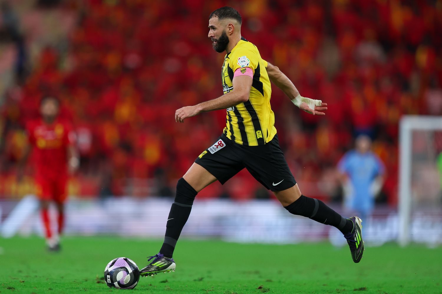Karim Benzema of Al Ittihad with the ball during the Saudi Pro League match between Al Ittihad v Al Qadsiah FC at King Abdullah Sports City on October 19, 2024 in Jeddah, Saudi Arabia.