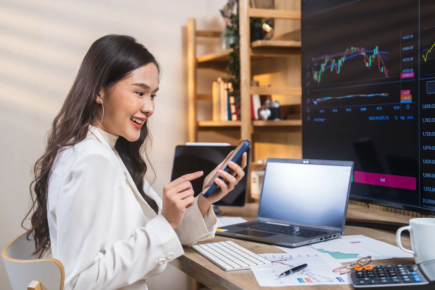An investor is searching for dividend stocks on a smartphone