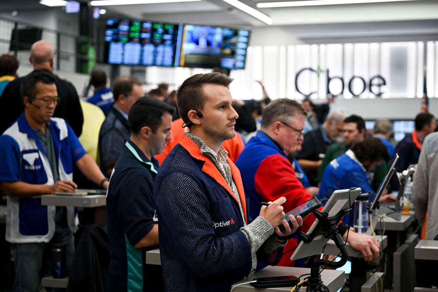 Traders work in the S&P options pit at the Cboe Global Markets exchange in Chicago