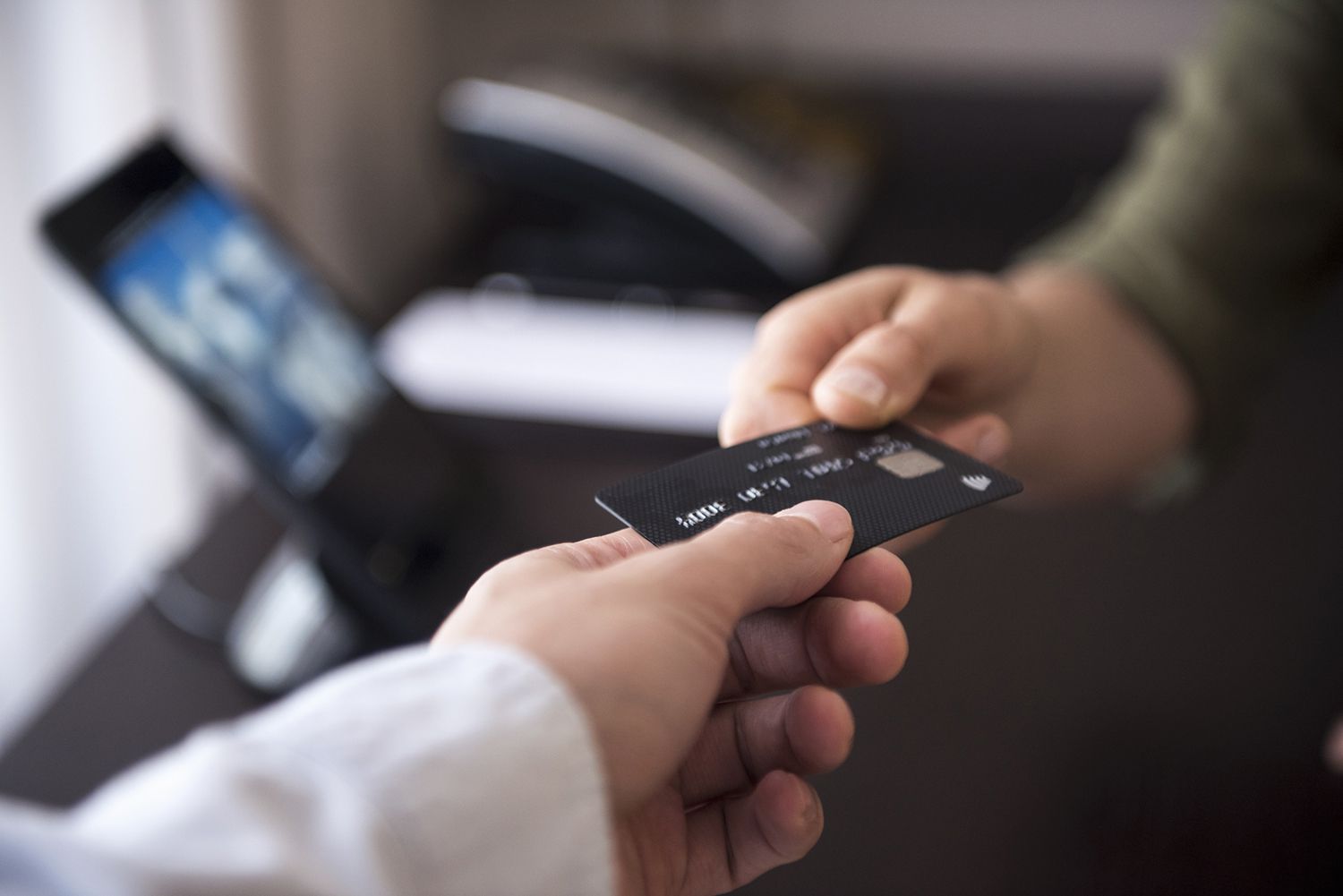 Handing Over Credit Card