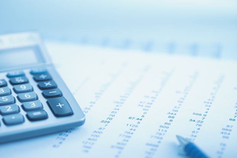 Close-up of calculator and data
