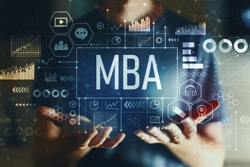 Torso of Man in Blue T-Shirt Holding a Graphic With MBA-Related Images That Fills the Overall Image