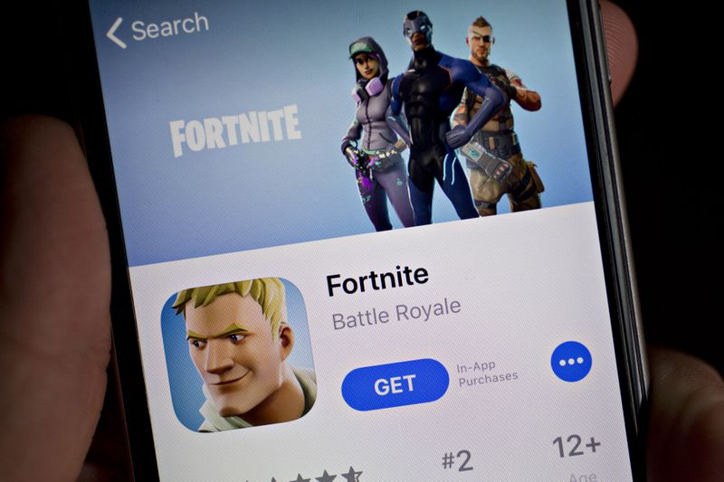 The Apple App Store page for Fortnite is displayed on an iPhone.