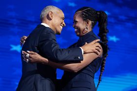 Michelle and Barack Obama Hugging