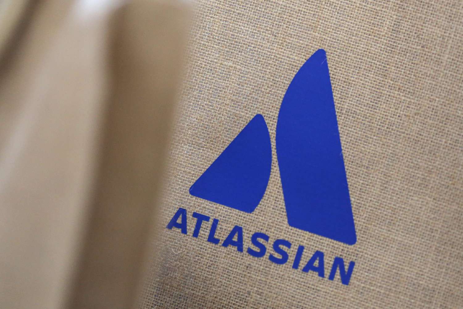 Signage of Atlassian Corporation on a bag