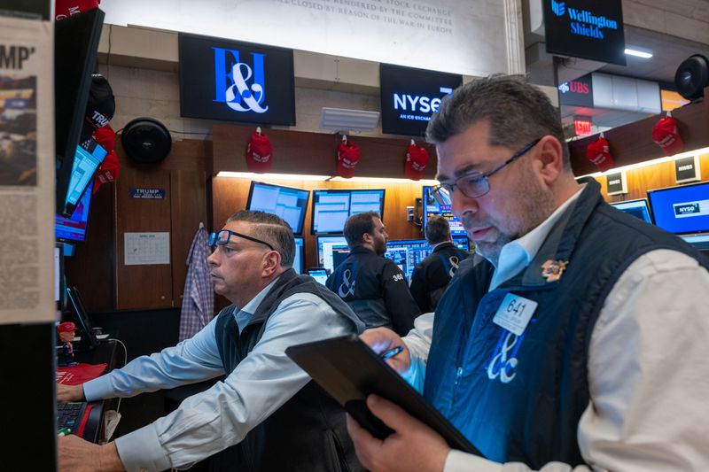 Traders work on the floor of the New York Stock Exchange