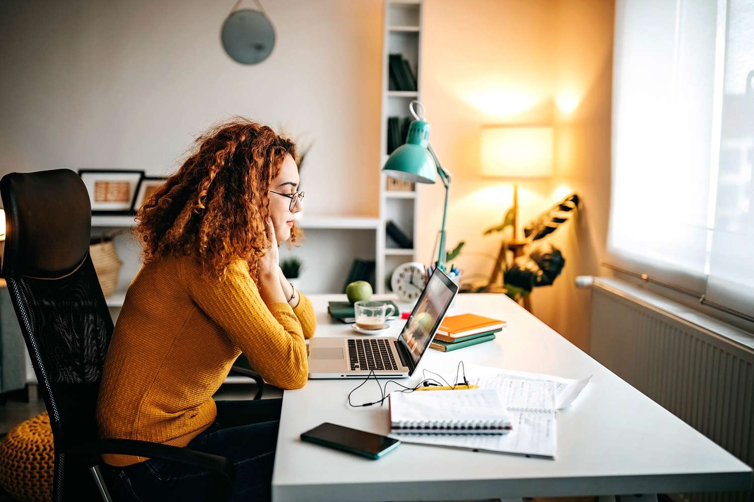 Image shows a student researching the best series 66 exam prep courses. 
