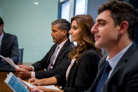 Business people in a business meeting.