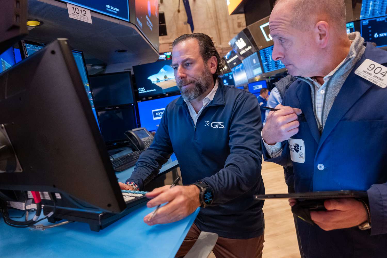 Traders work on the floor of the New York Stock Exchange (NYSE).