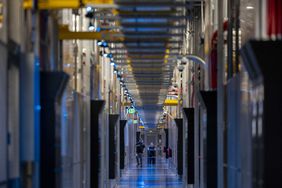 People walk through the hallways at Equinix Data Center in Ashburn, Virginia