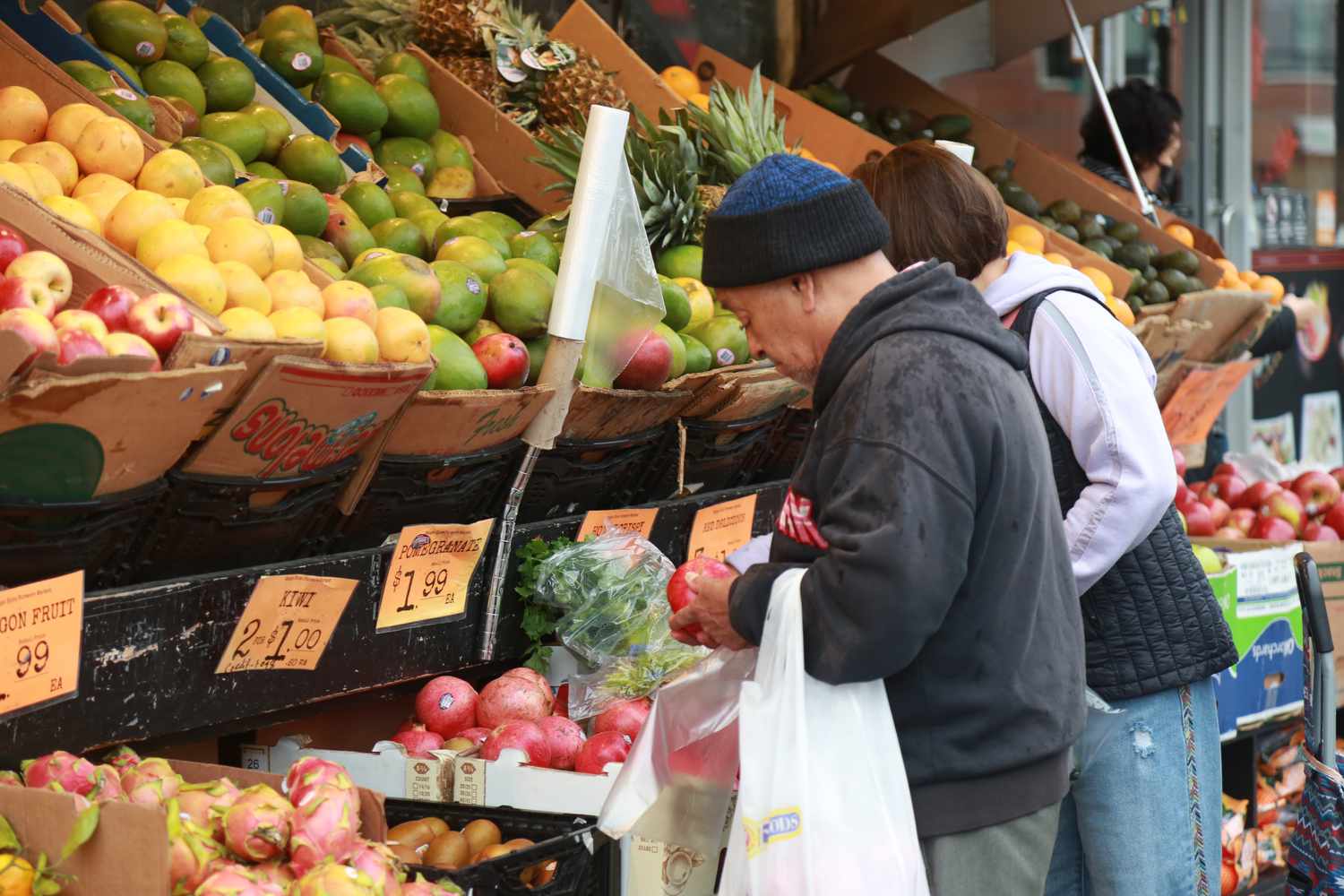 Customers shop at a grocery store in New York City, on Dec. 11, 2024. 