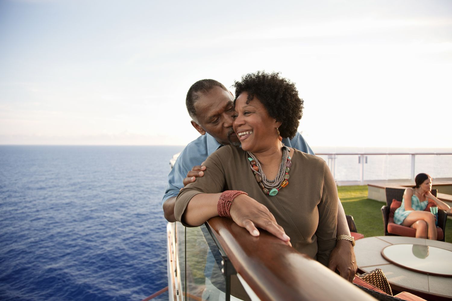 Senior couple cuddling on a cruise ship