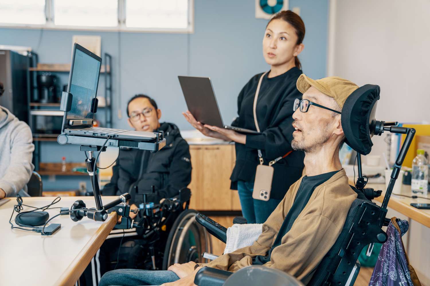 People with varying abilities working in an office