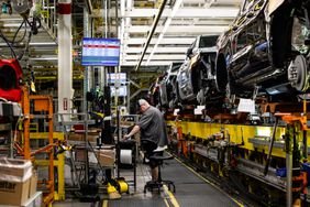 Chevrolet Silverado 1500s and GMC Sierra 1500s on the assembly line at the General Motors assembly plant in Fort Wayne, Indiana, US, on Tuesday, April 9, 2024.