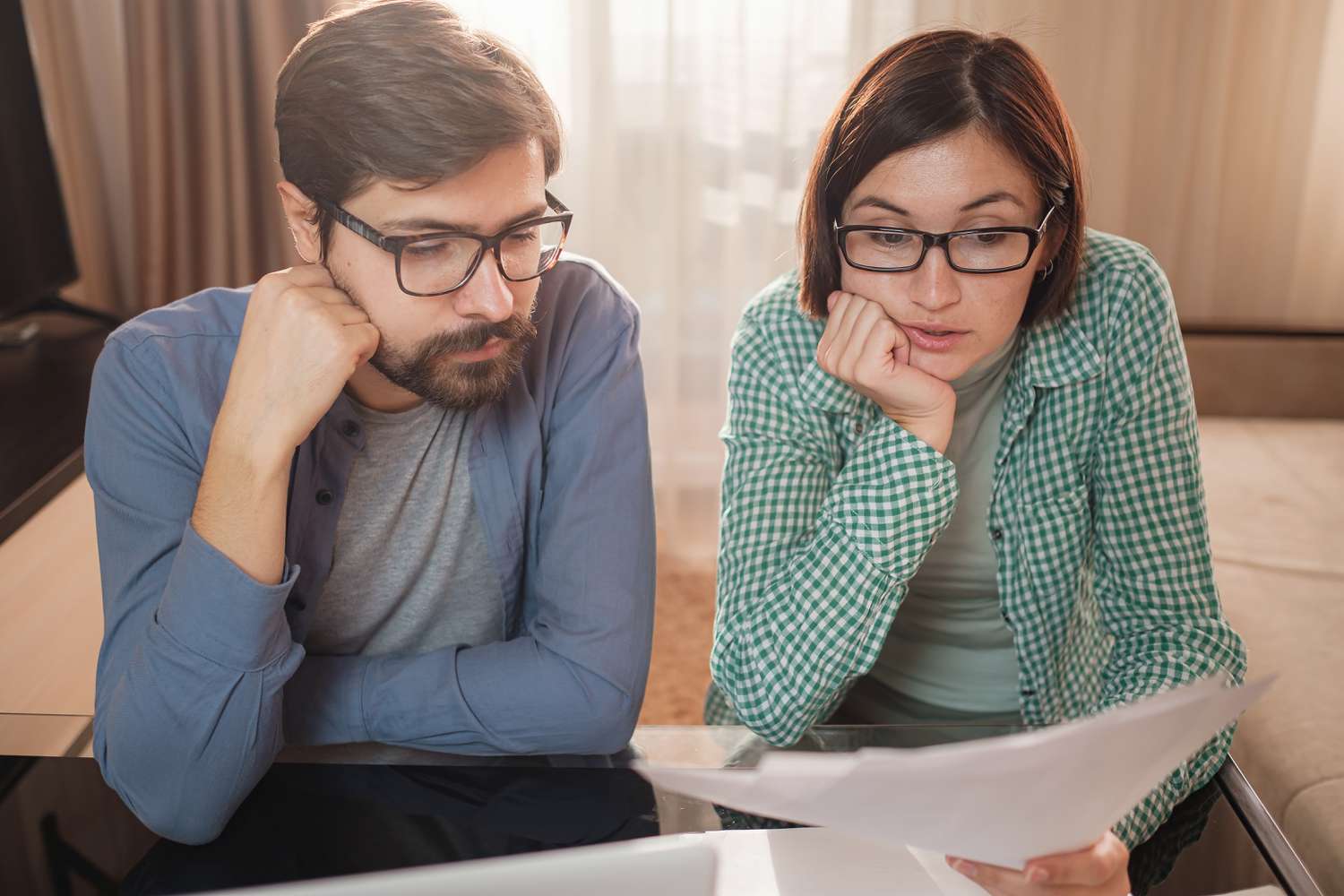 A frustrated couple upon receiving documents of them being considered judgment proof.