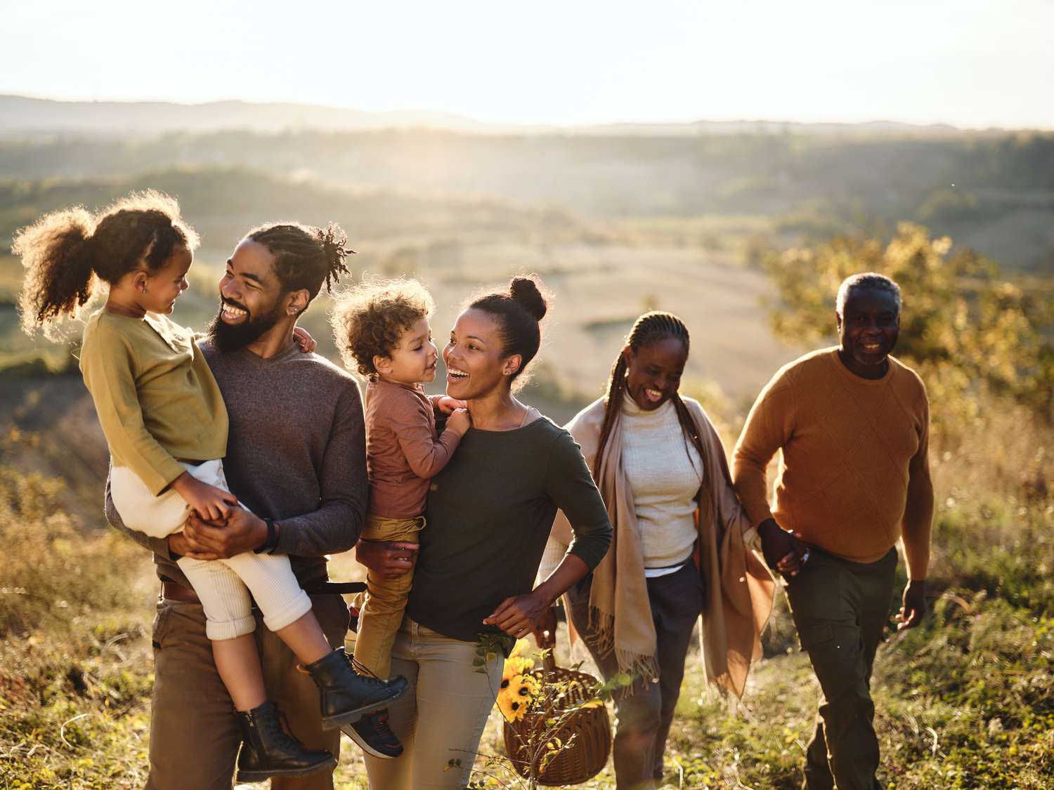 A multigenerational family in a field