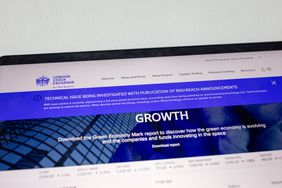 A computer screen displays a London Stock Exchange announcement of technical issues being investigated due to an IT outage on July 19, 2024 in London, UK
