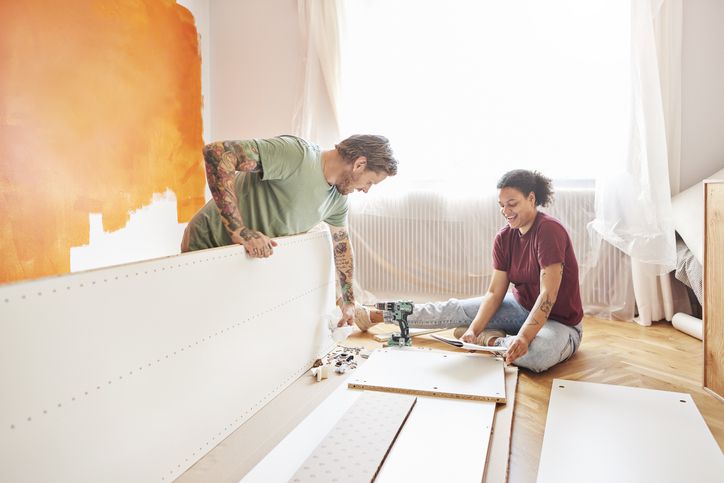 Couple working on home improvement