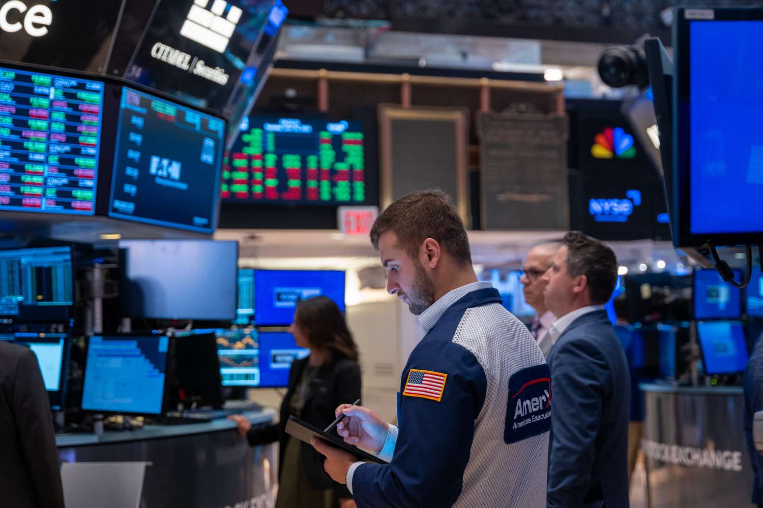 Traders work on the floor of the New York Stock Exchange