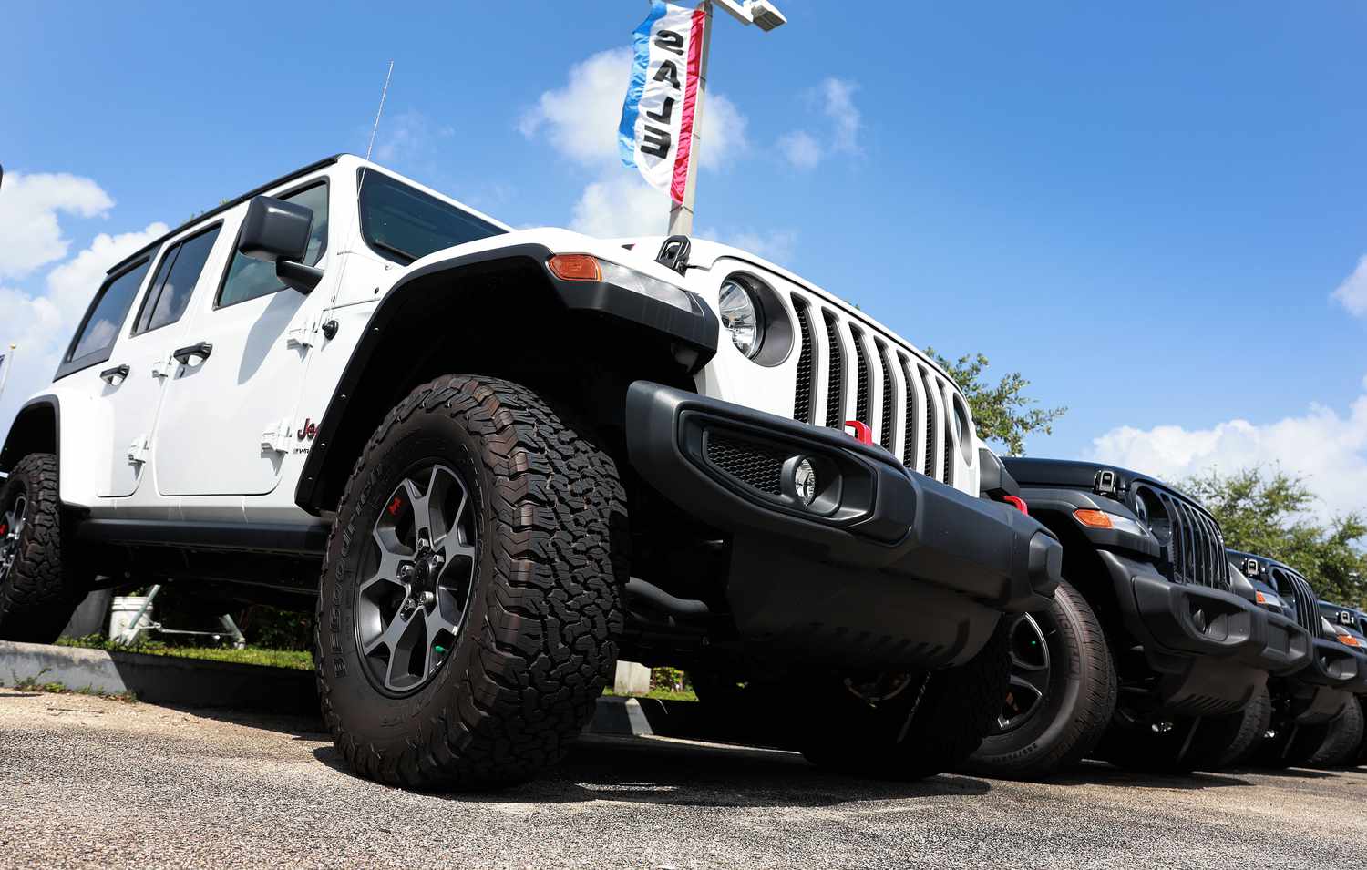 New Jeep vehicles sit on a Dodge Chrysler-Jeep Ram dealership's lot on October 03, 2023 in Miami, Florida.