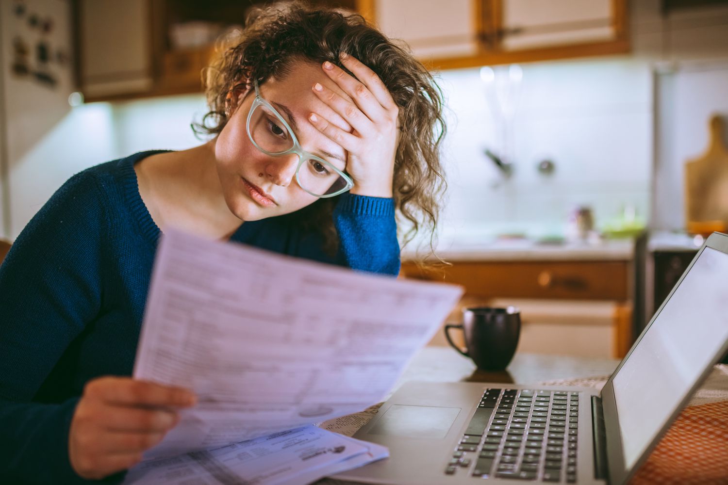 Woman going through bills