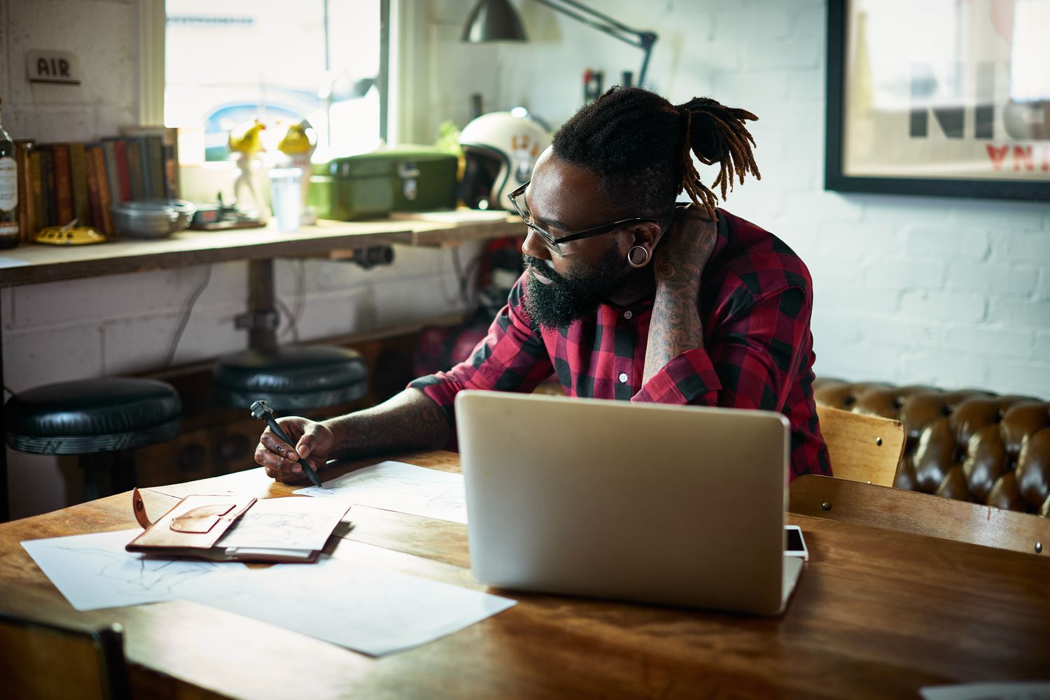 Man considers the repayment terms of a home equity loan against those of a reverse mortgage