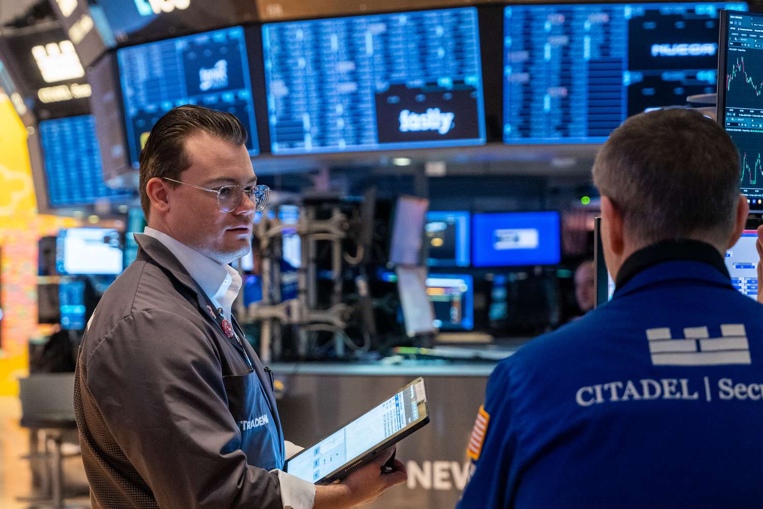 Traders work on the floor of the New York Stock Exchange 