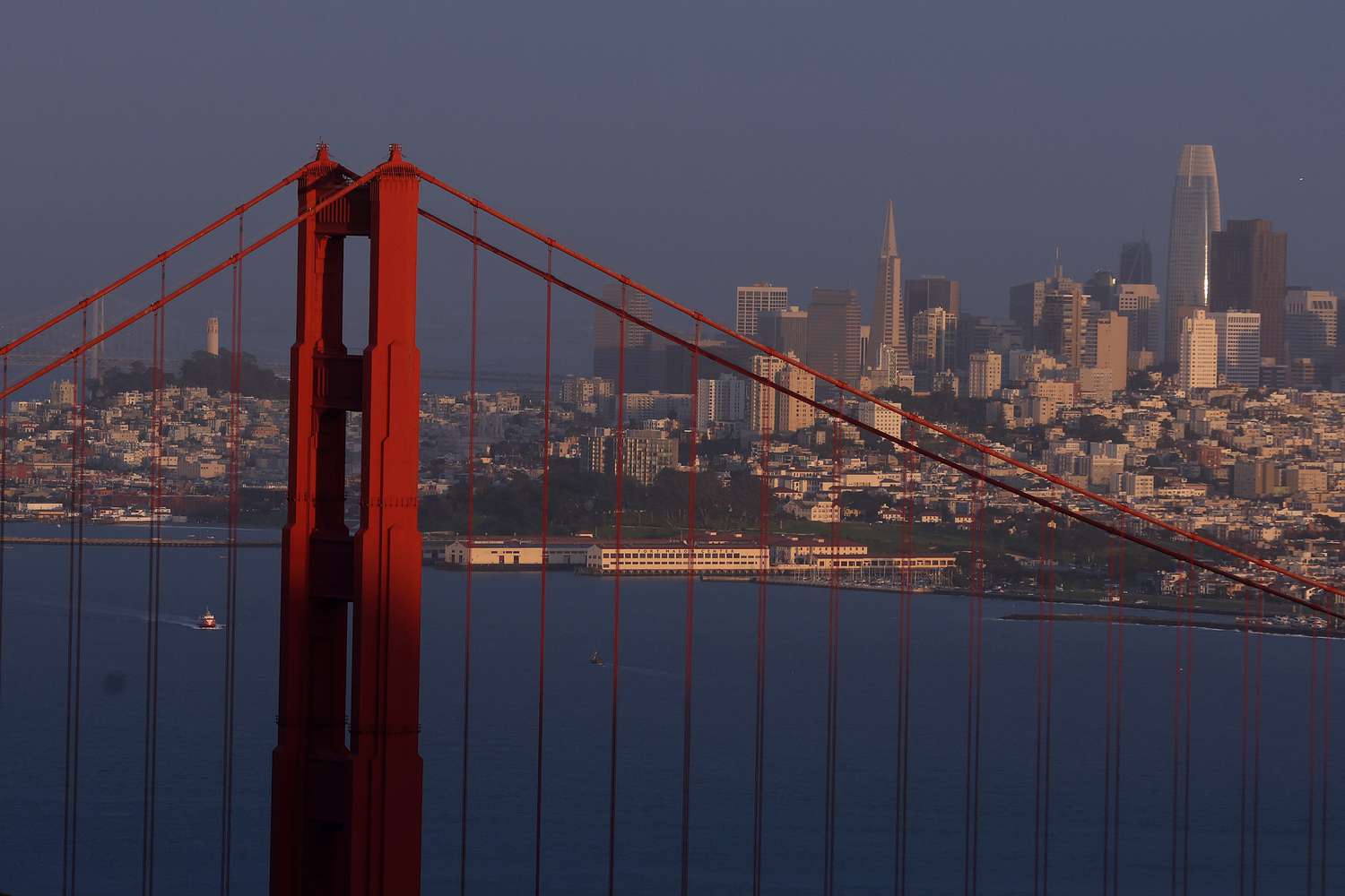 The Golden Gate Bridge stands in front of the San Francisco skyline