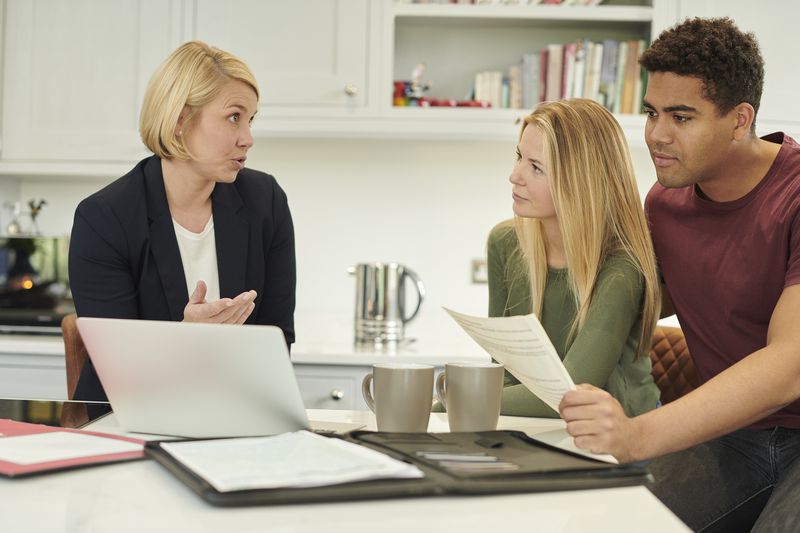 Couple getting consultation about loans