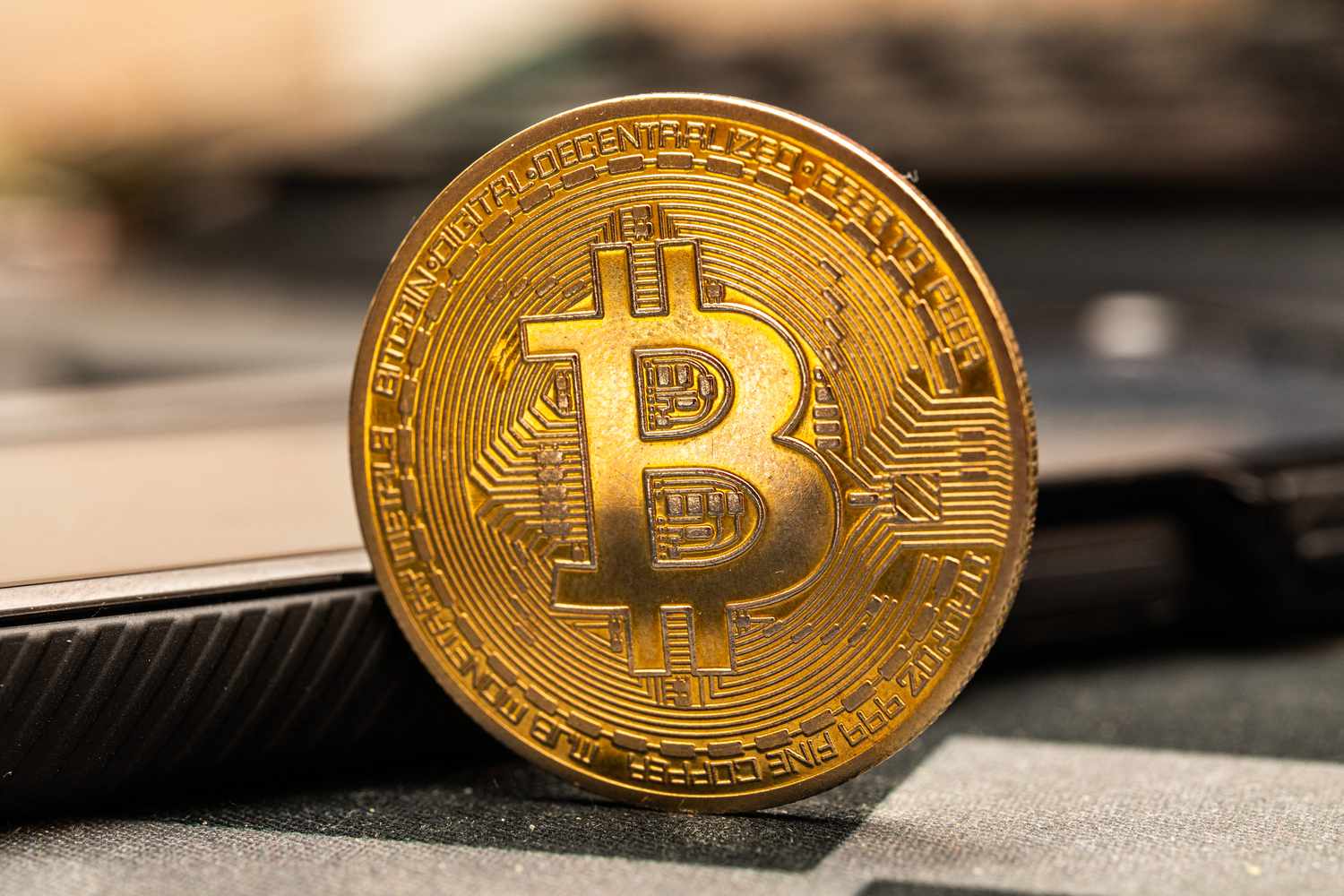 Bitcoin cryptocurrency cryptomonnaie coin placed on a desk in Clermont-Ferrand, France, on May 16, 2025