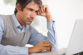 Consumer deciding on whether or not to take a personal loan during recession.