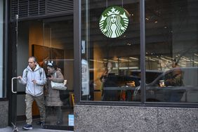 People leaving a Starbucks in New York City