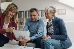 Senior Couple meeting financial advisor.