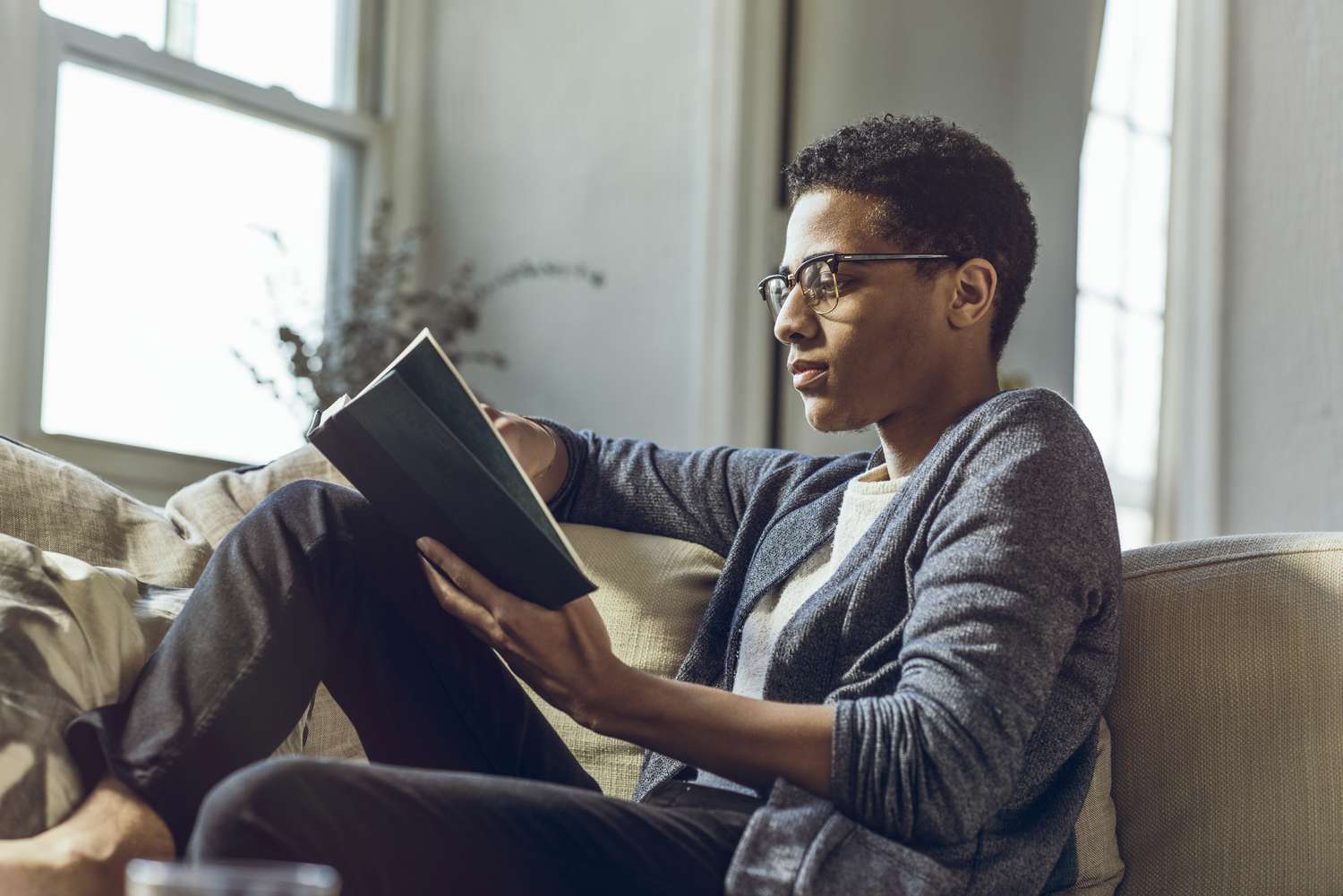 Man managing his student loans while in college