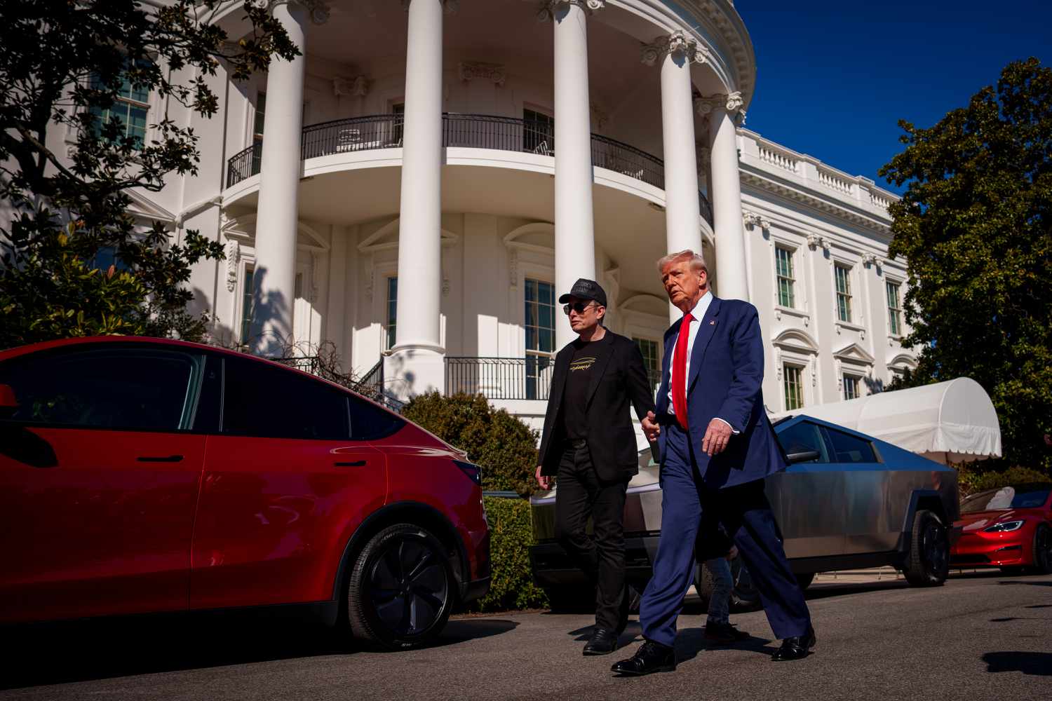 U.S. President Donald Trump and White House Senior Advisor, Tesla and SpaceX CEO Elon Musk depart after looking at Tesla vehicles on the South Lawn of the White House on March 11, 2025 in Washington, DC. 
