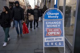 Money exchange sign on a street in London’s Oxford Street