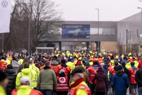 Striking Volkswagen workers walking inside the Volkswagen factory on December 2, 2024 in Emden, Germany