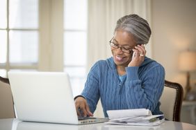Senior on the phone getting information about Medigap plan.